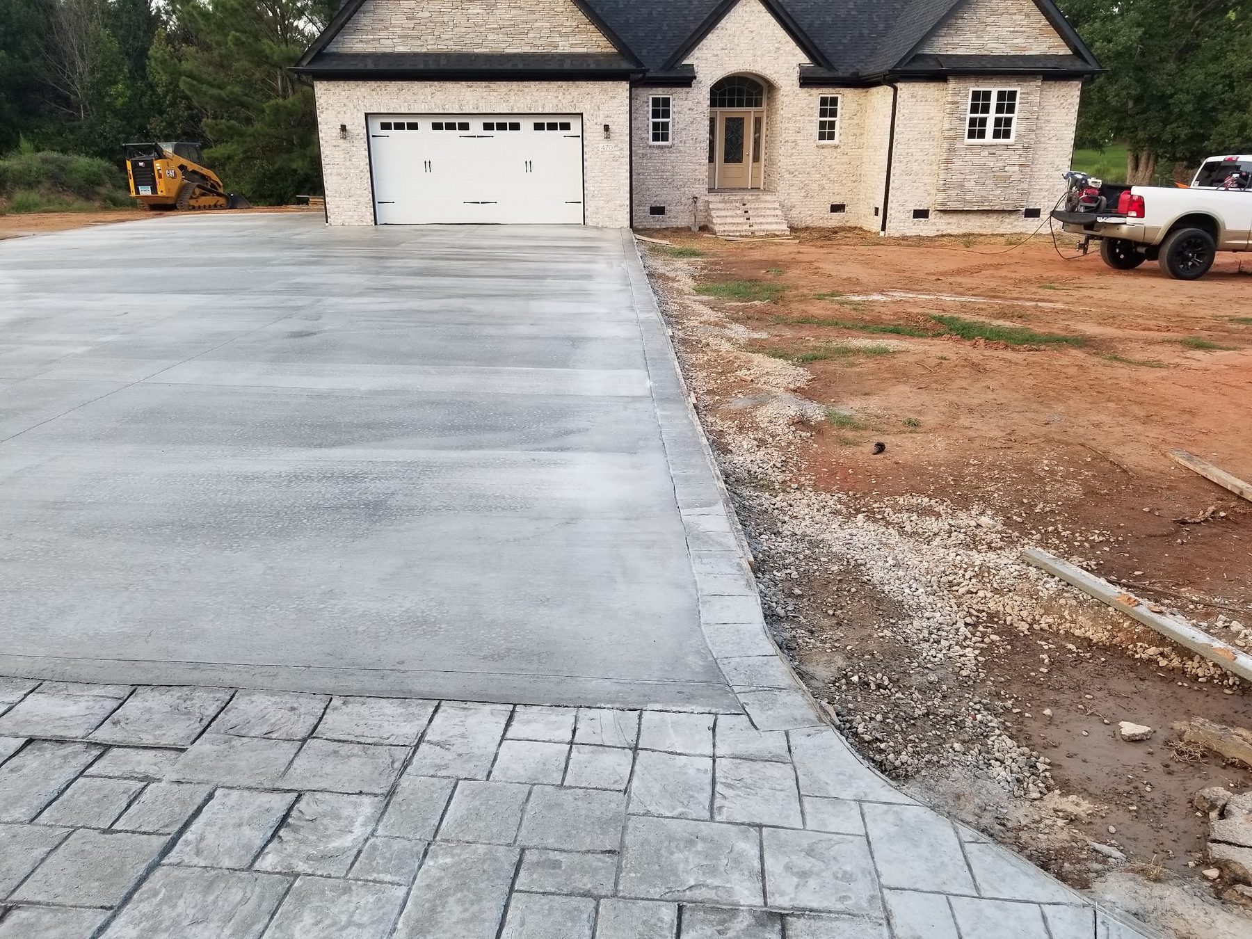 Finished concrete driveway poured by Tessco Construction